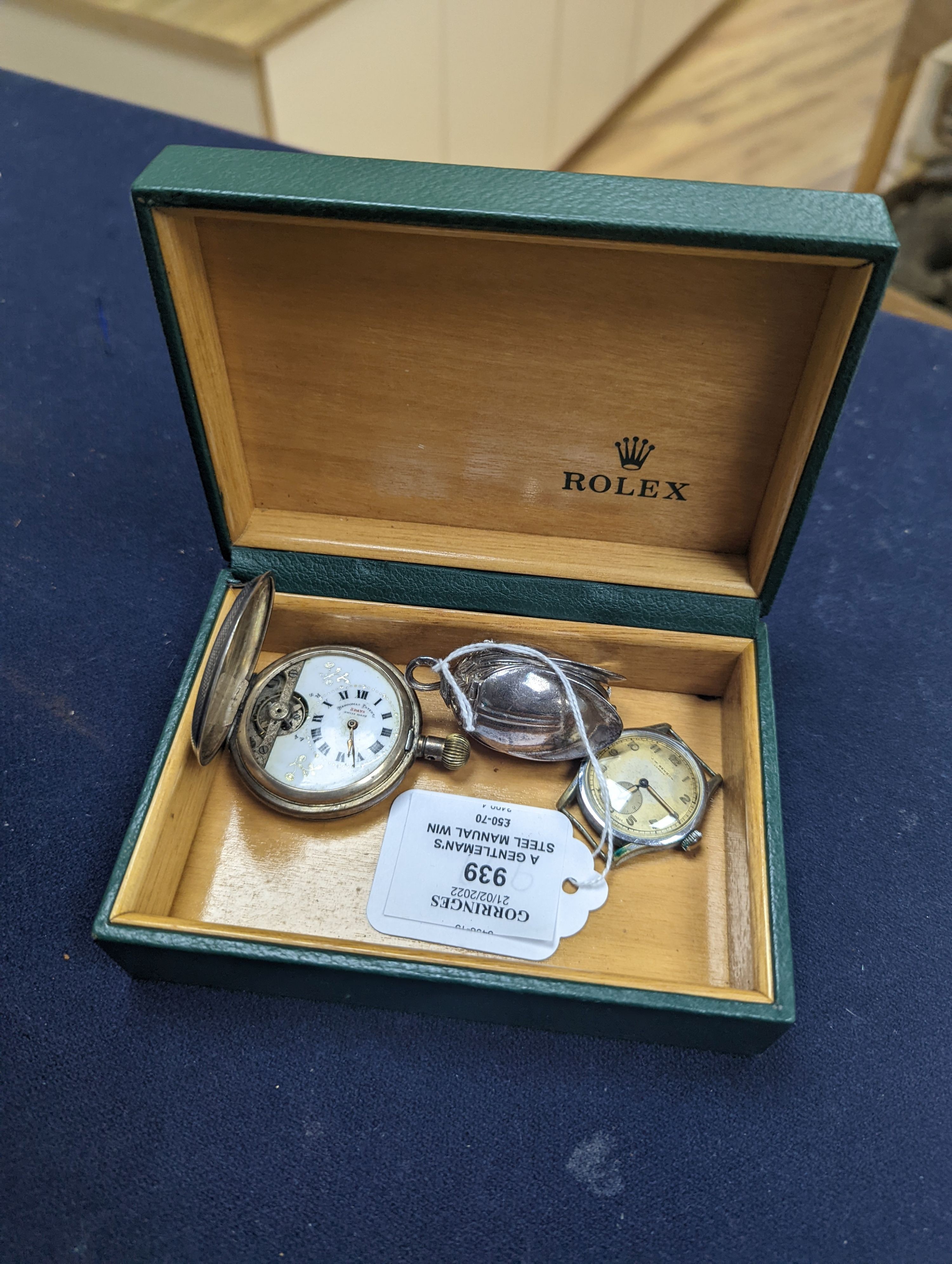 A gentleman's steel manual wind wrist watch, retailed by J.W. Benson, two other watches including silver pocket watch and a Rolex box.